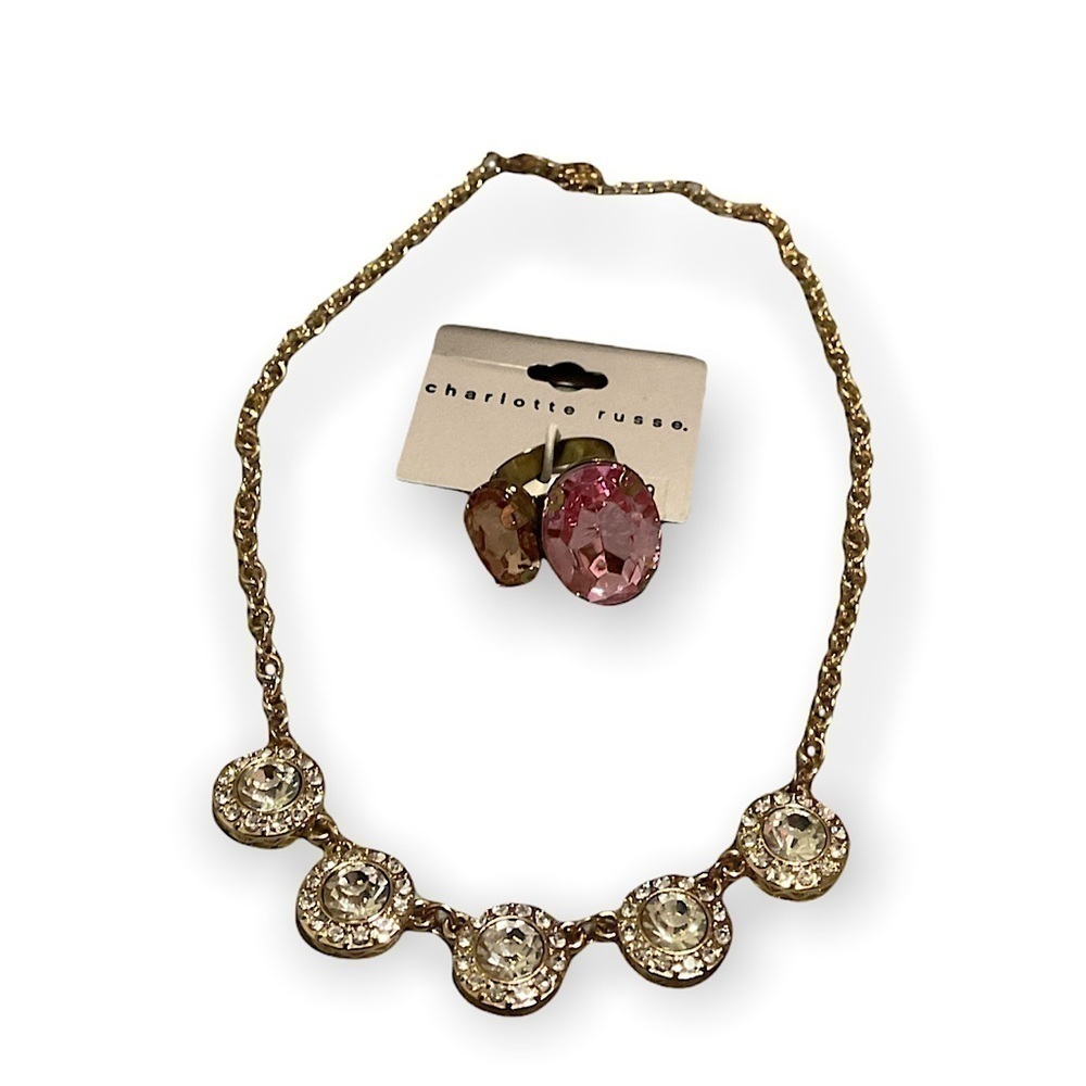 Necklace with a Charlotte peach and ring size 9